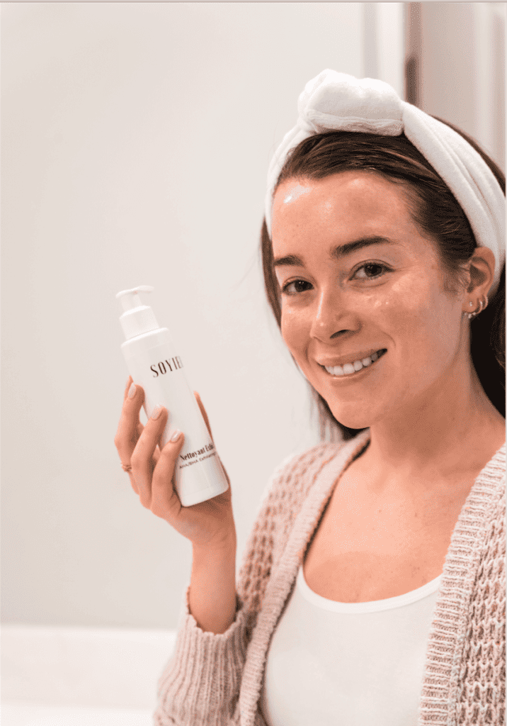 CHEMICAL VS MECHANICAL EXFOLIATION 9 A women holding serum in hand | gfacemd | Wellesley